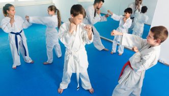 martial arts students practicing punch moves