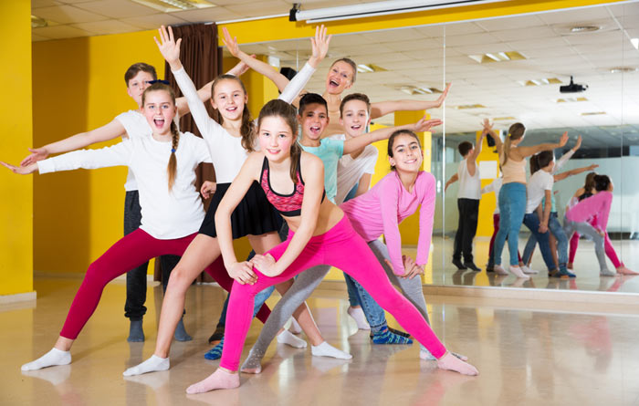 dance class group with boys and girls and instructor