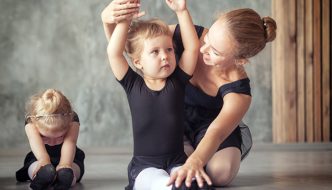 dance instructor with two preschool dance students