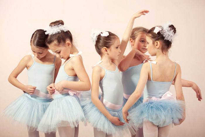 group of young ballerina girls wearing light blue dance dresses