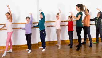 dance teacher with guys and girls as dance students
