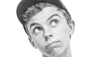 boy comedian wearing baseball cap and pondering